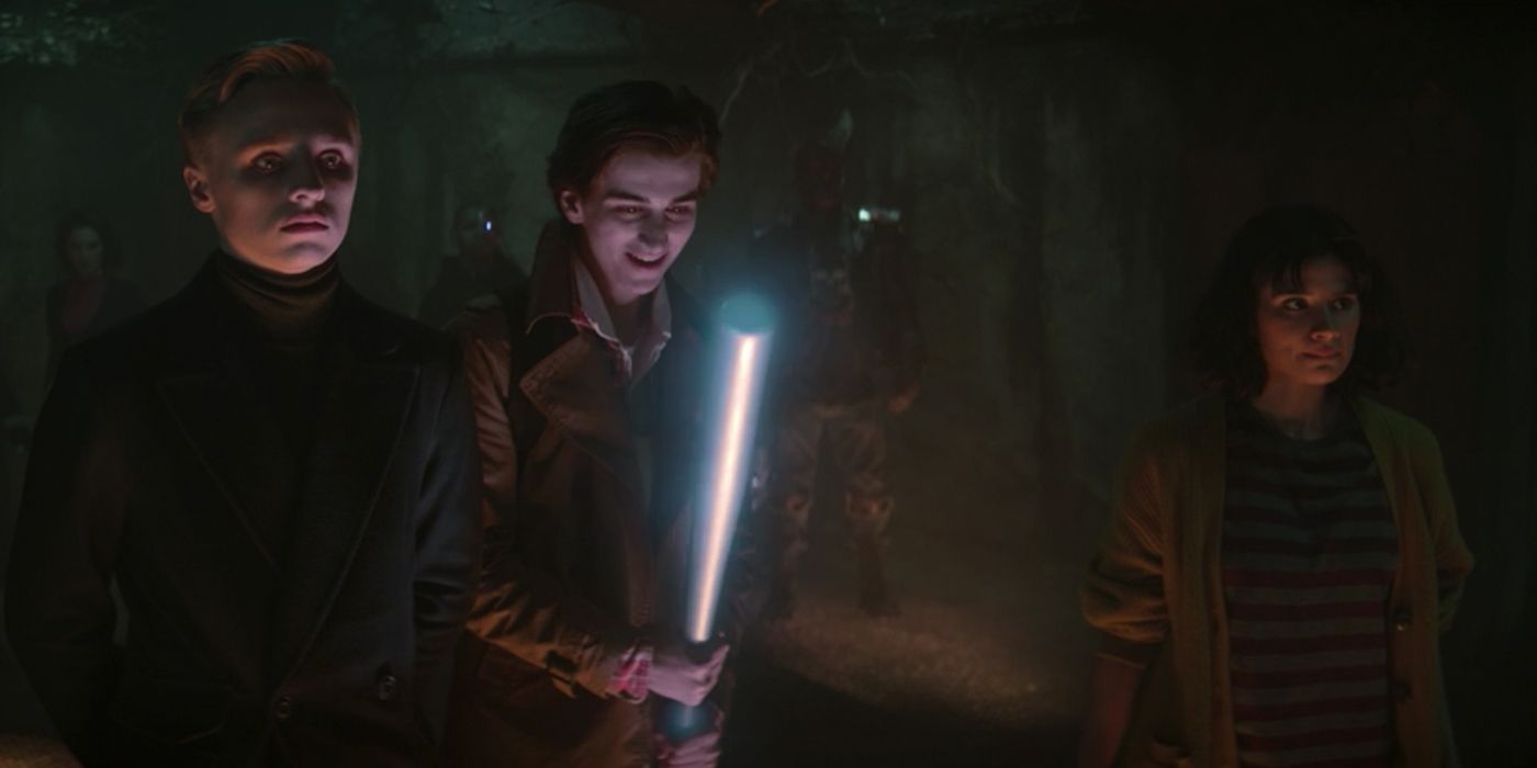 Dead Boy Detective Edwin (Ty Tennant) and Charles (Sebastian Croft) wielding a baseball bat in Doom Patrol.