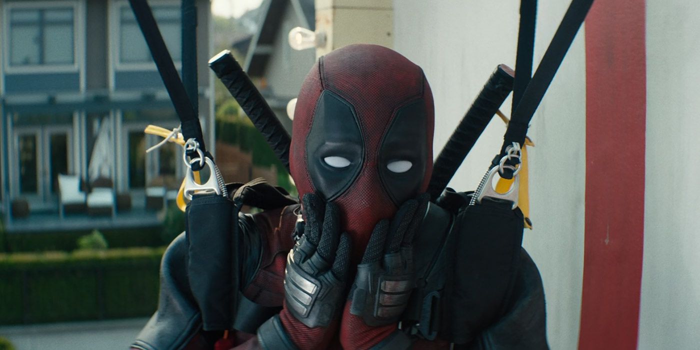 Deadpool puts his hands to his face in comical horror in Deadpool 2.