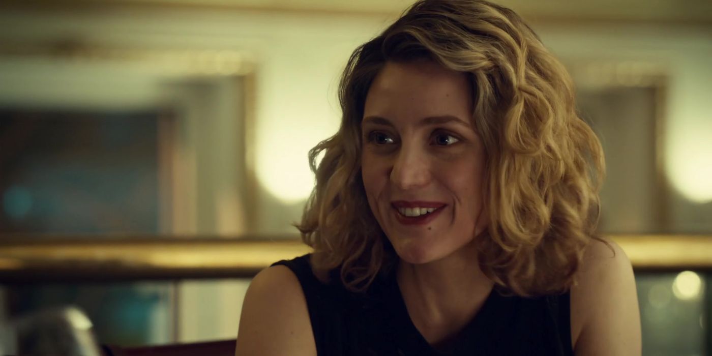A photo of Delphine smiling in the show Orphan Black.