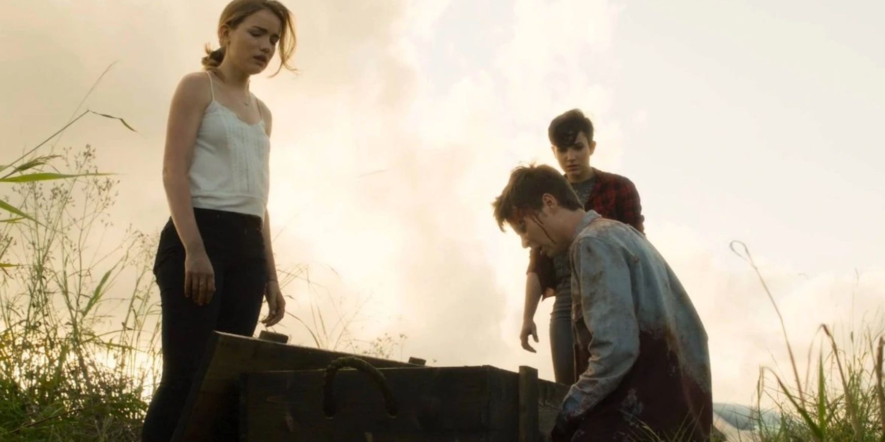 Emma, Audrey, and Noah discover Zoe's body in a makeshift coffin in Scream episode The Vanishing