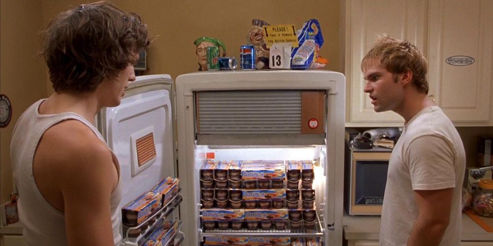 Jesse and Chester look at a fridge full of pudding cups in Dude, Where’s my Car