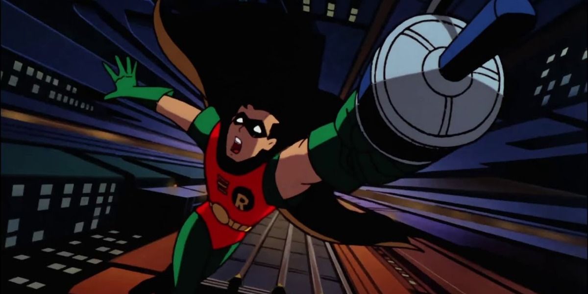 Robin dangles from his grappling hook.