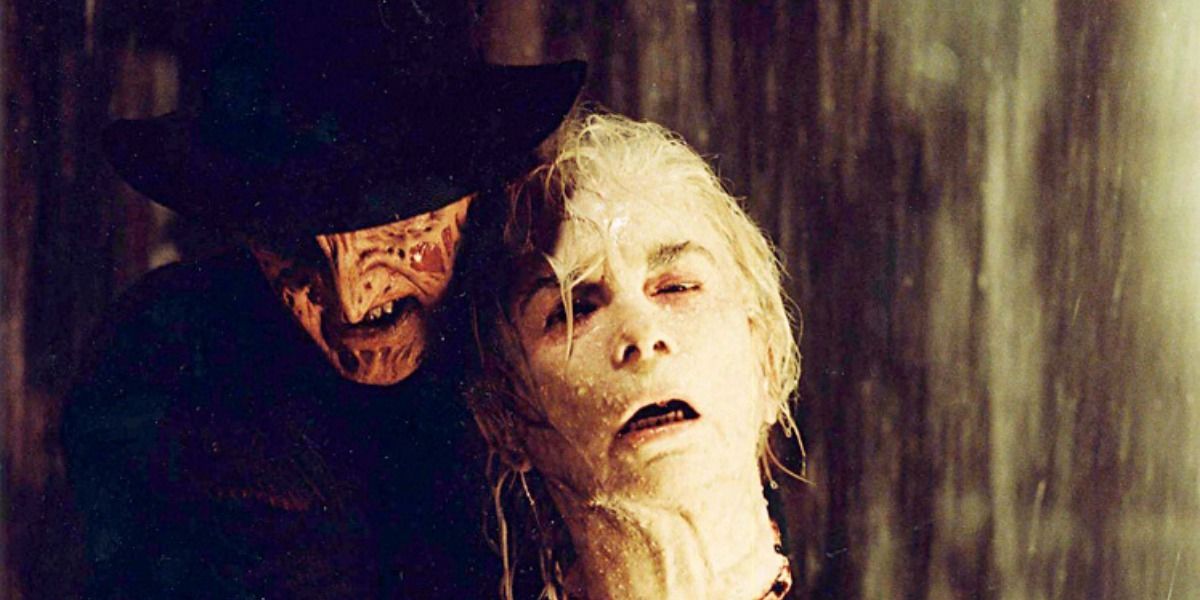 Freddy Krueger holds Pamela Voorhees head to mess with Jason.