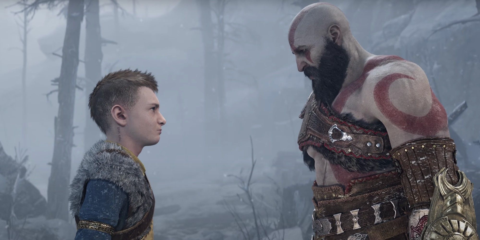 Kratos and atreus look at each other in god of war