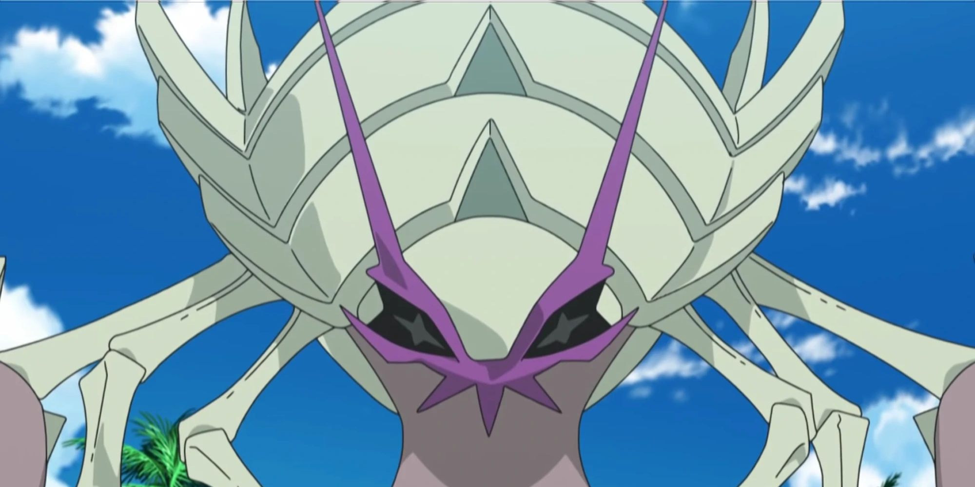 Golisopod stands against a blue sky in the Pokemon anime.