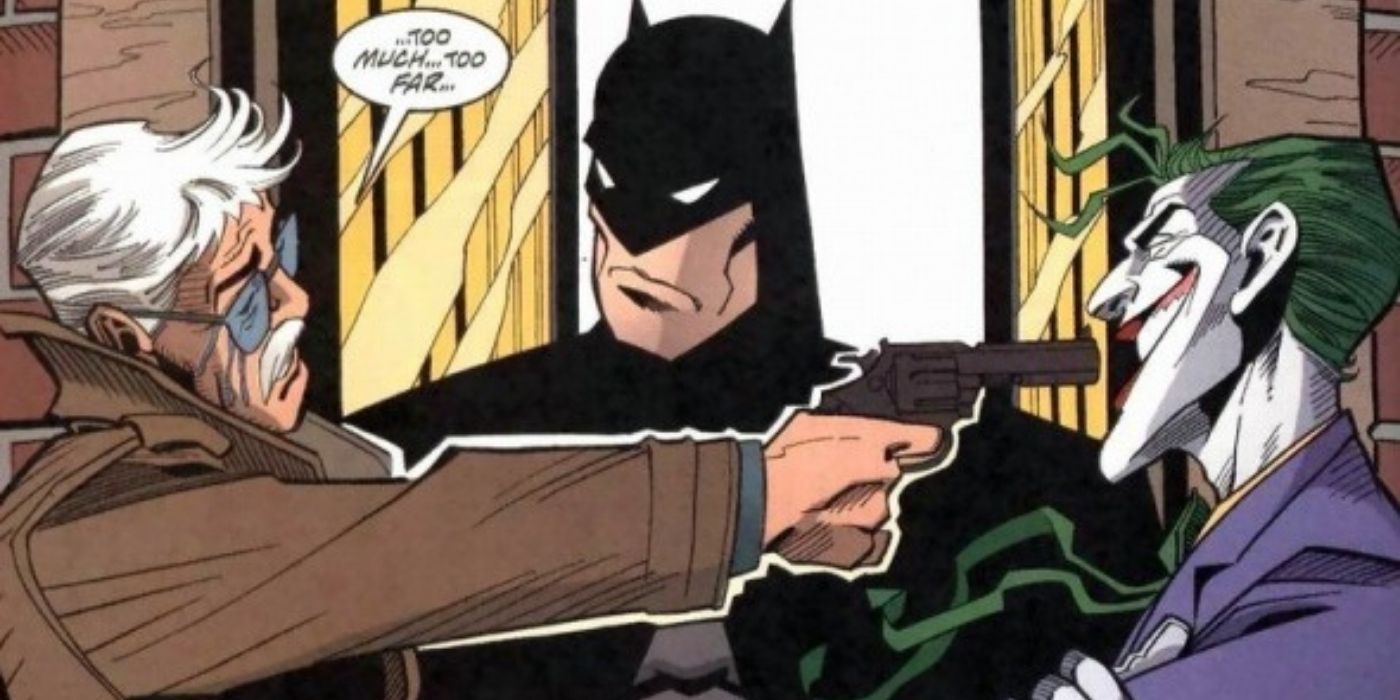 Gordon pointing a gun at the Joker