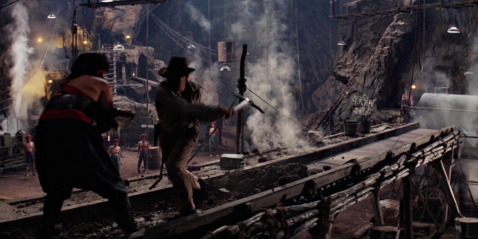 Indy fights a slave overseer in Indiana Jones and the Temple of Doom
