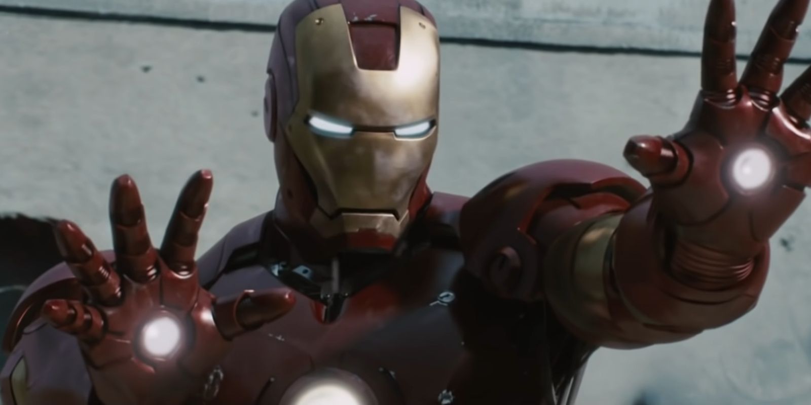Robert Downey Jr. as Iron Man aiming his repulsors in Iron Man 2008