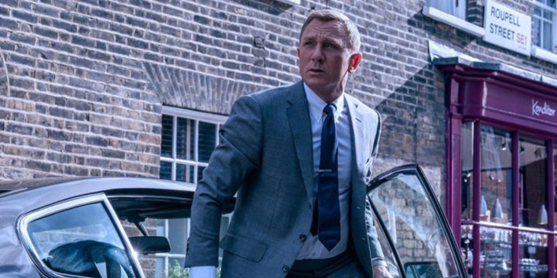 James Bond gets out of a car in No Time to Die.