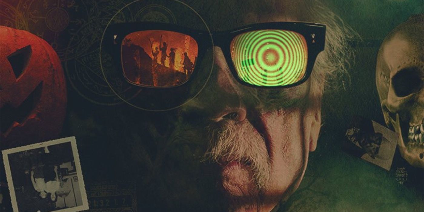 An image of John Carpenter's head, wearing funky psychedelic shades