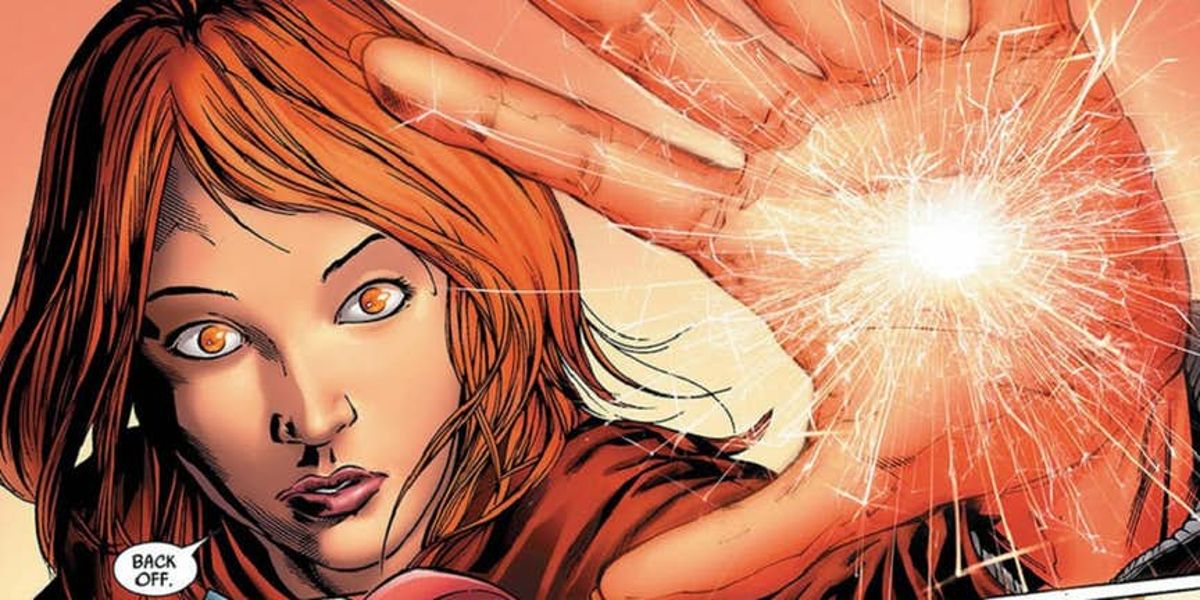 Justine Hammer AKA Crimson Cowl breaking glass with her hand in Marvel comics.