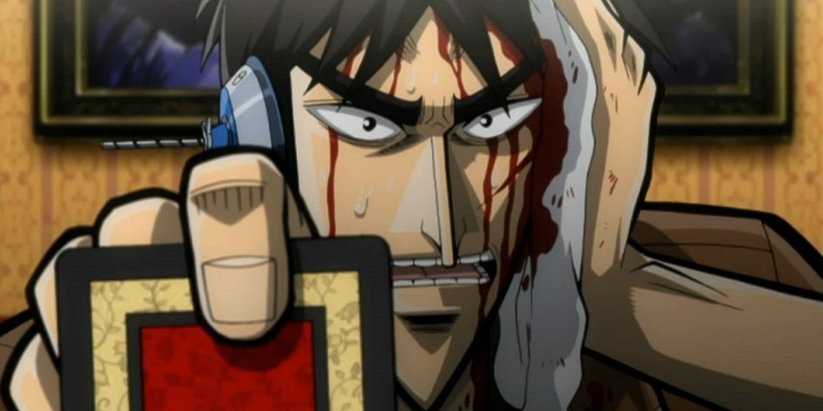 A bloodied Kaiji holding up a card in Kaiji: Ultimate Survivor.