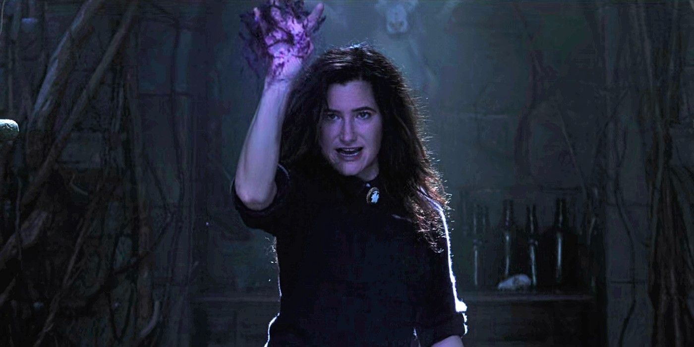 Agatha Harkness raises her arm and casts a spell in WandaVision.