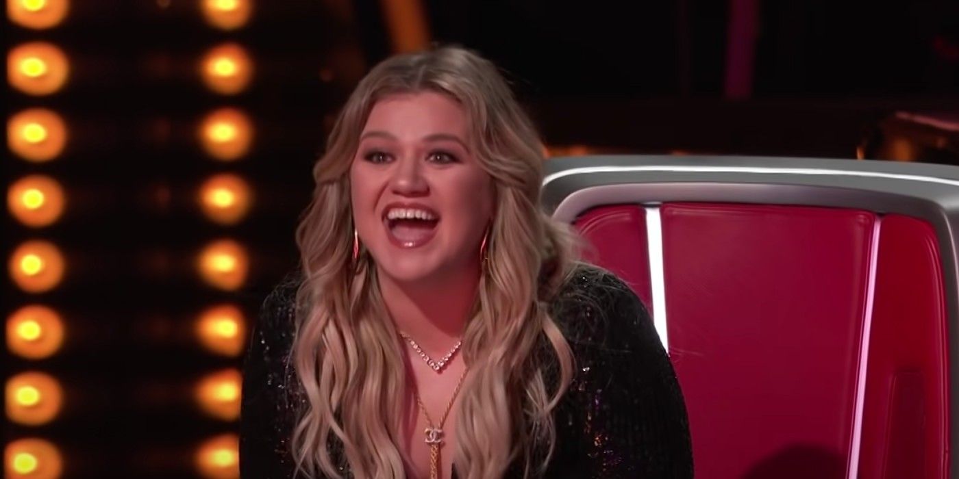 Kelly Clarkson smiling on The Voice