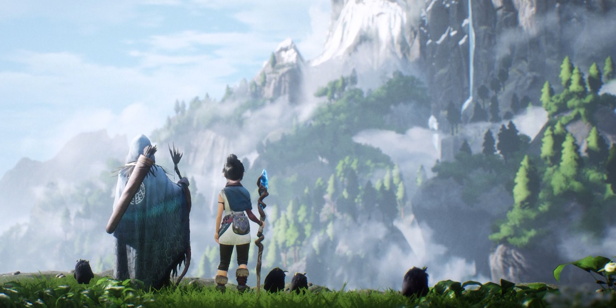 A cutscene still shows the beautiful scenery of the world of Kena: Bridge of Spirits.