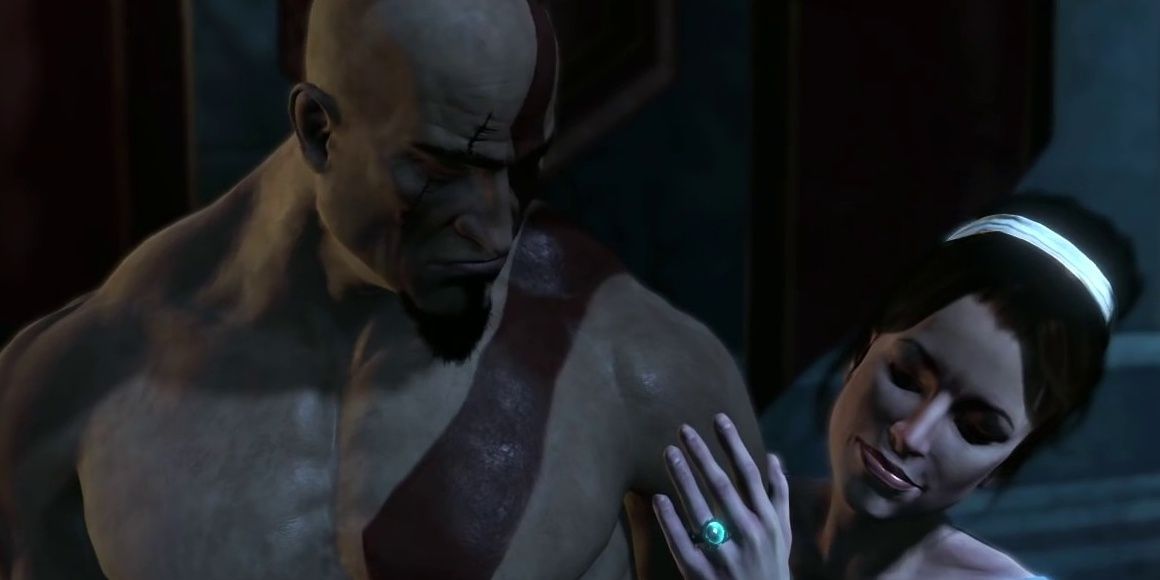 Kratos is comforted by his wife in God of War Ascension
