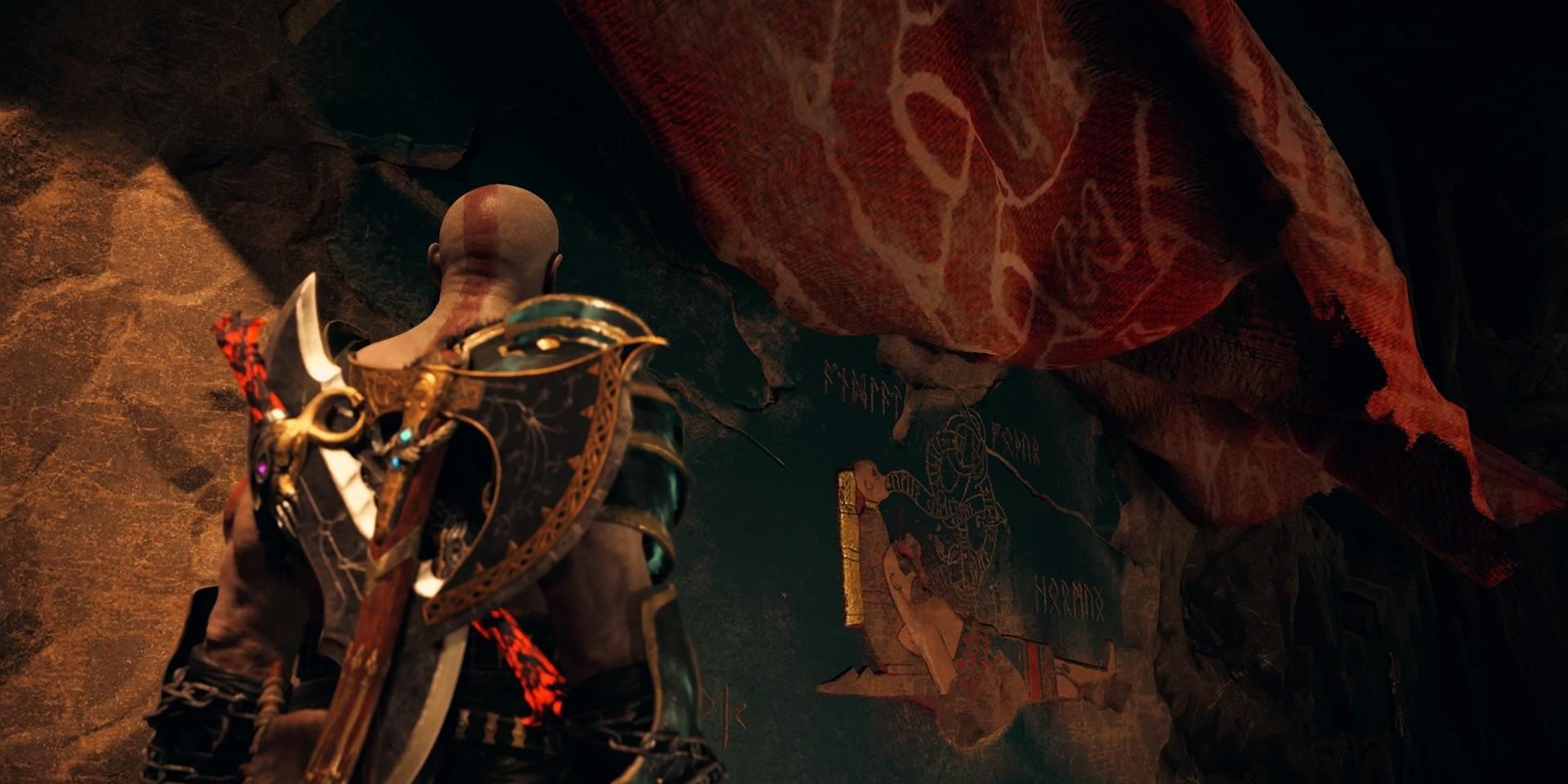 Kratos looks at the tapestry in Jotunheim in God of War 