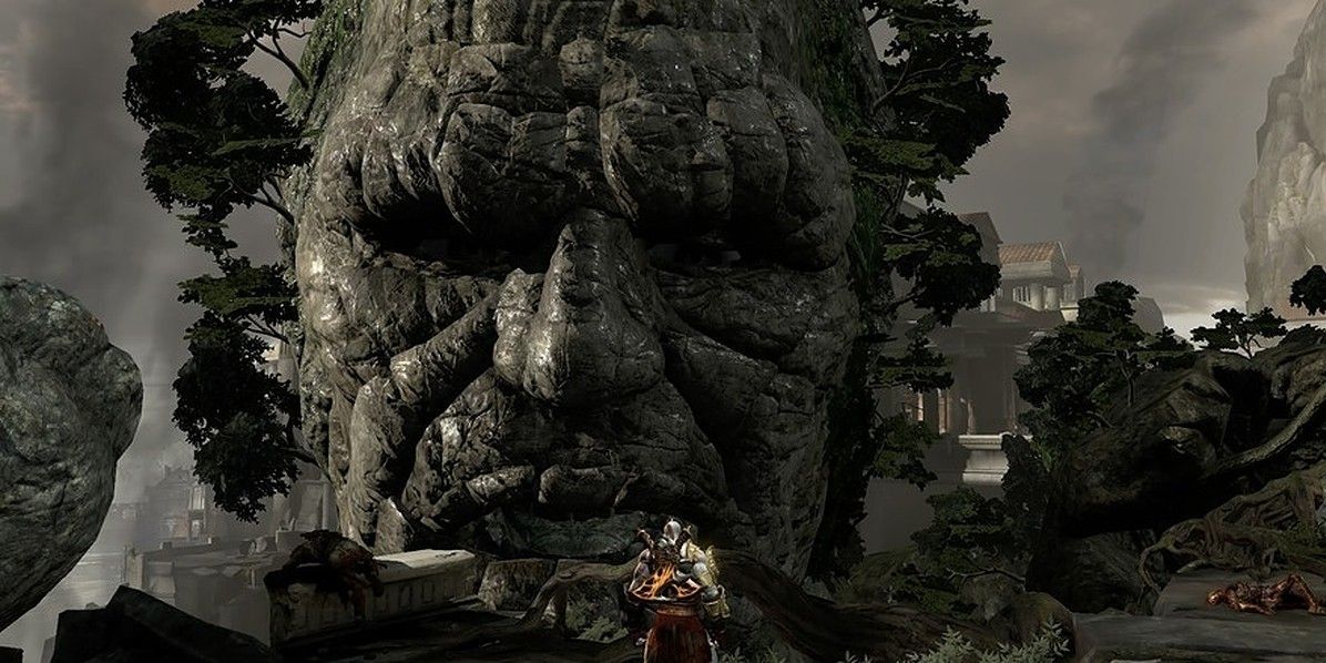 An image of Kratos talking to Gaia in God of War III