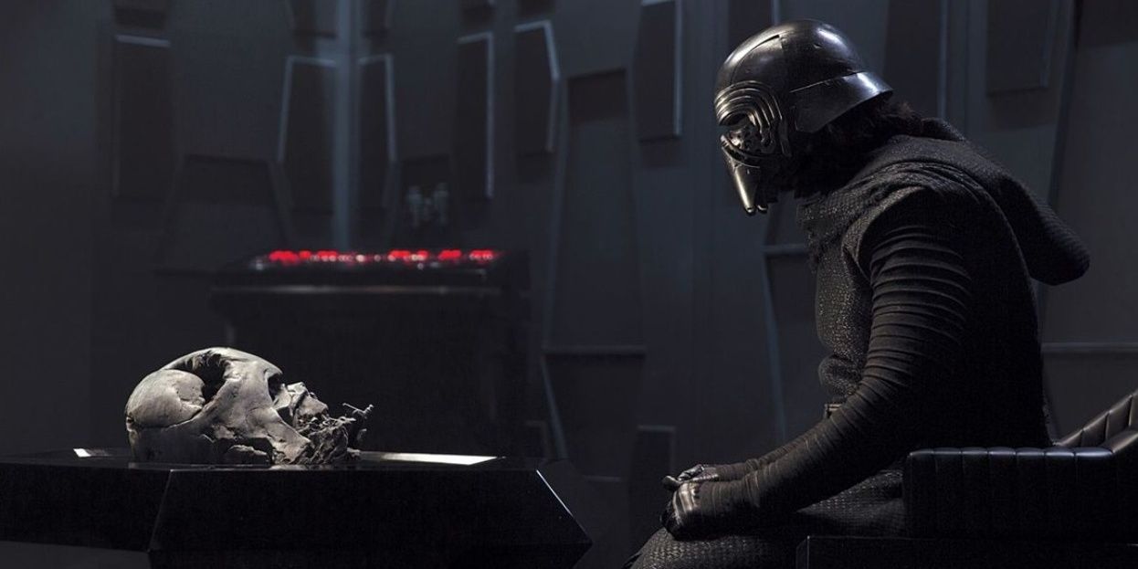 Kylo Ren talks to Darth Vader's helmet