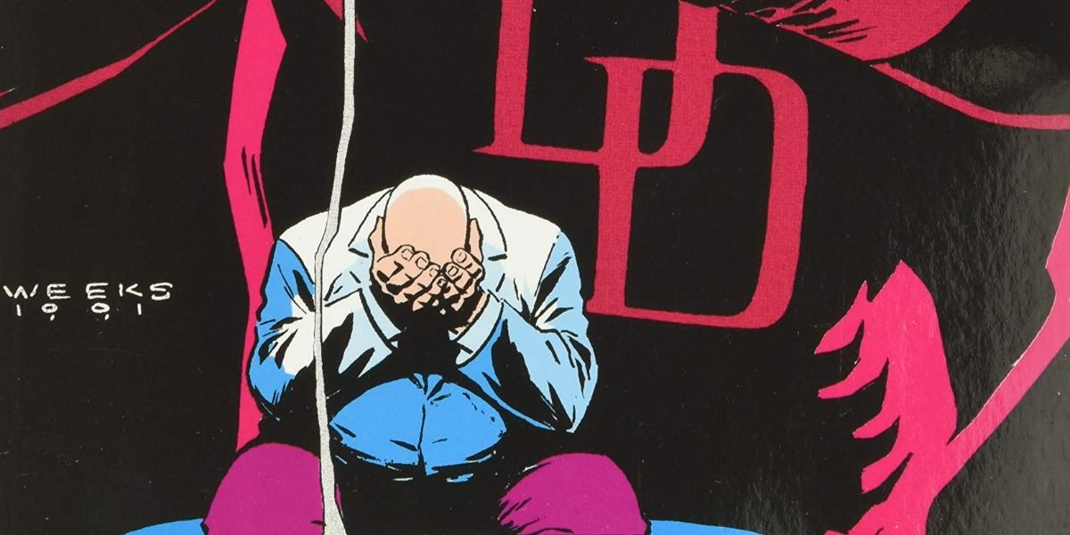 Kingpin cries into his hands,