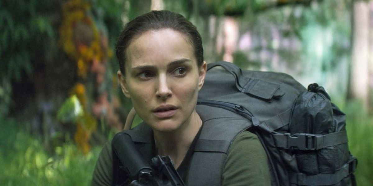 Lena from Annihilation dressed in combat gear in a forest.