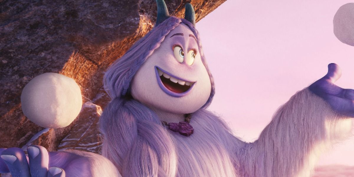 Meechee from Smallfoot tossing snowballs and smiling