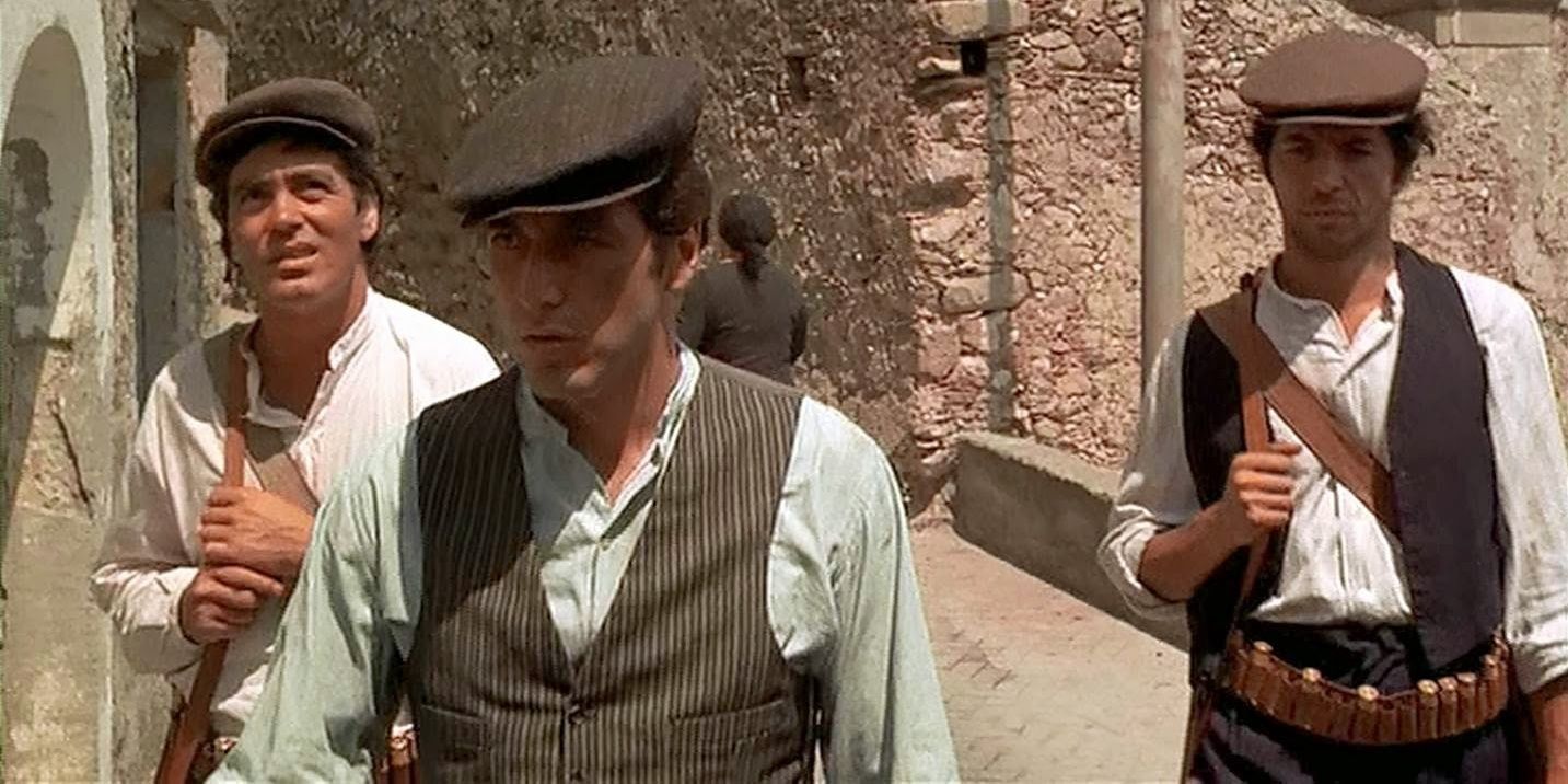 Michael Corleone with his bodyguards' Fabrizio and Carlo during his time in exile in Sicily in The Godfather 