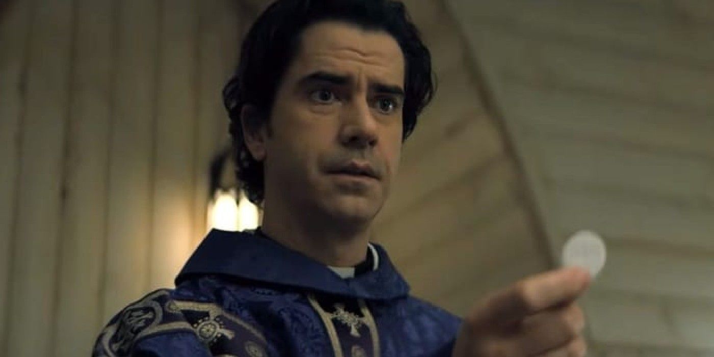 Father Paul (Hamish Linklater) giving communion in Midnight Mass