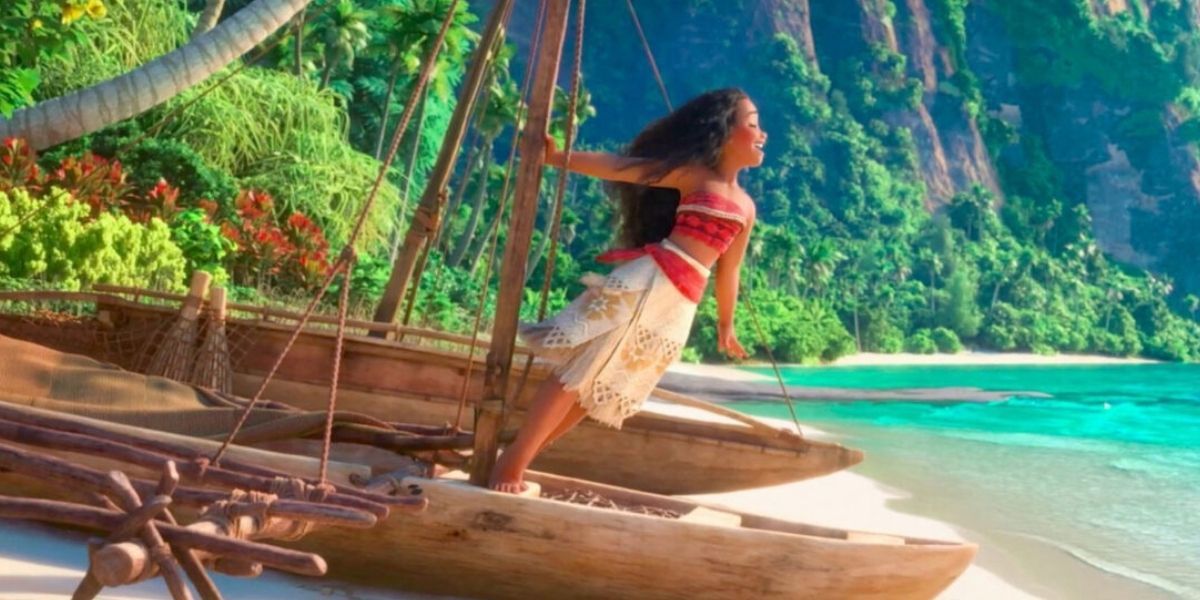 Moana standing on a boat looking at the ocean in Moana (2016)