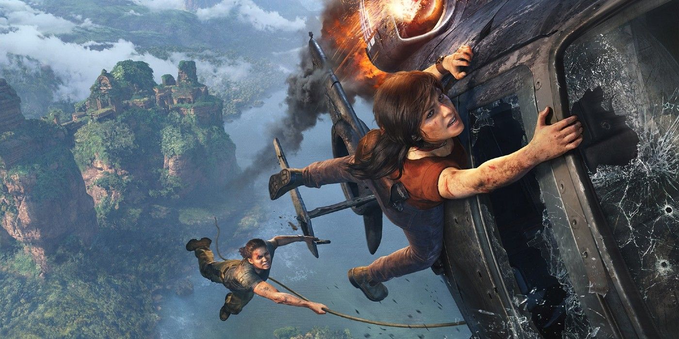 Nadine and Chloe hang on the side of a chopper in Uncharted The Lost Legacy