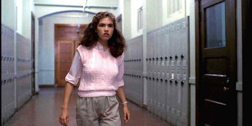 Nancy Thompson standing in a corridor in A Nightmare On Elm Street