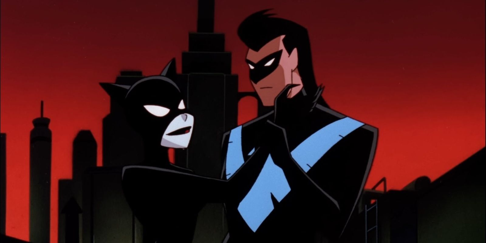 Nightwing holding Catwoman's hand in The New Batman Adventures
