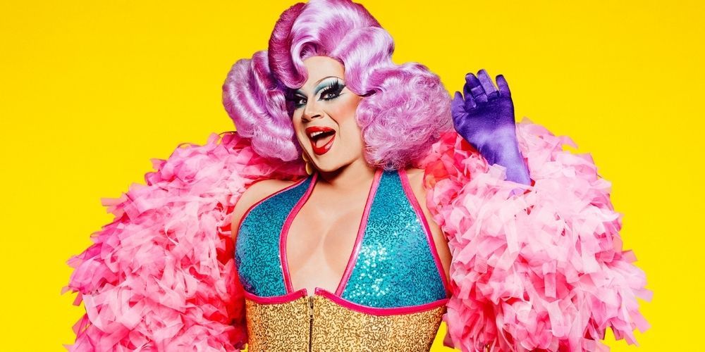 Nina West poses in a RuPaul's Drag Race cast photo.