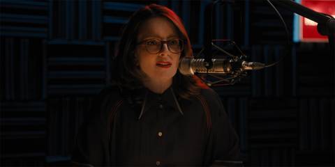 Tina Fey as Cinda Canning talking to a microphone in Only Murders in the Building