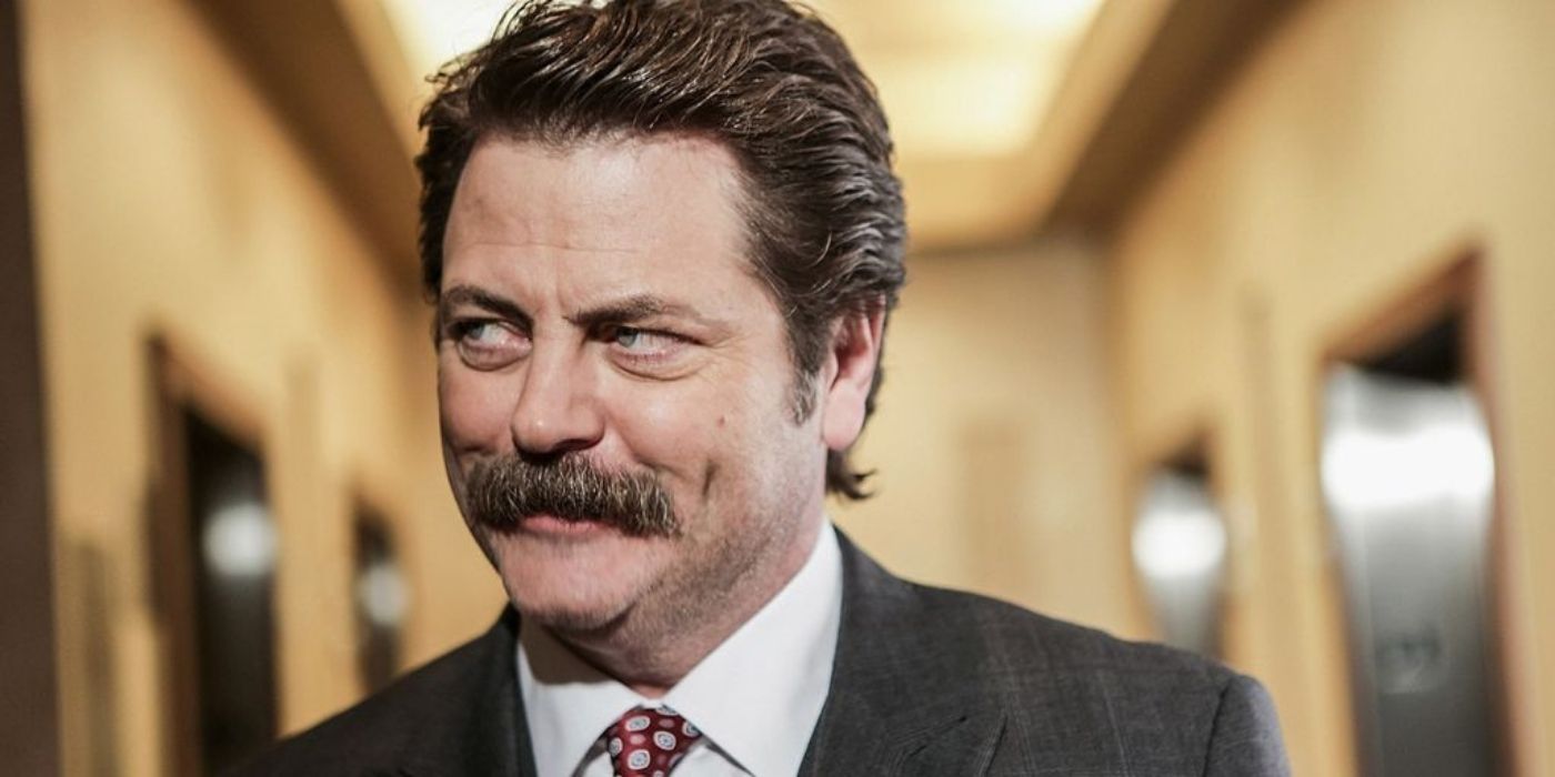 Ron Swanson smiling in Parks and Recreation