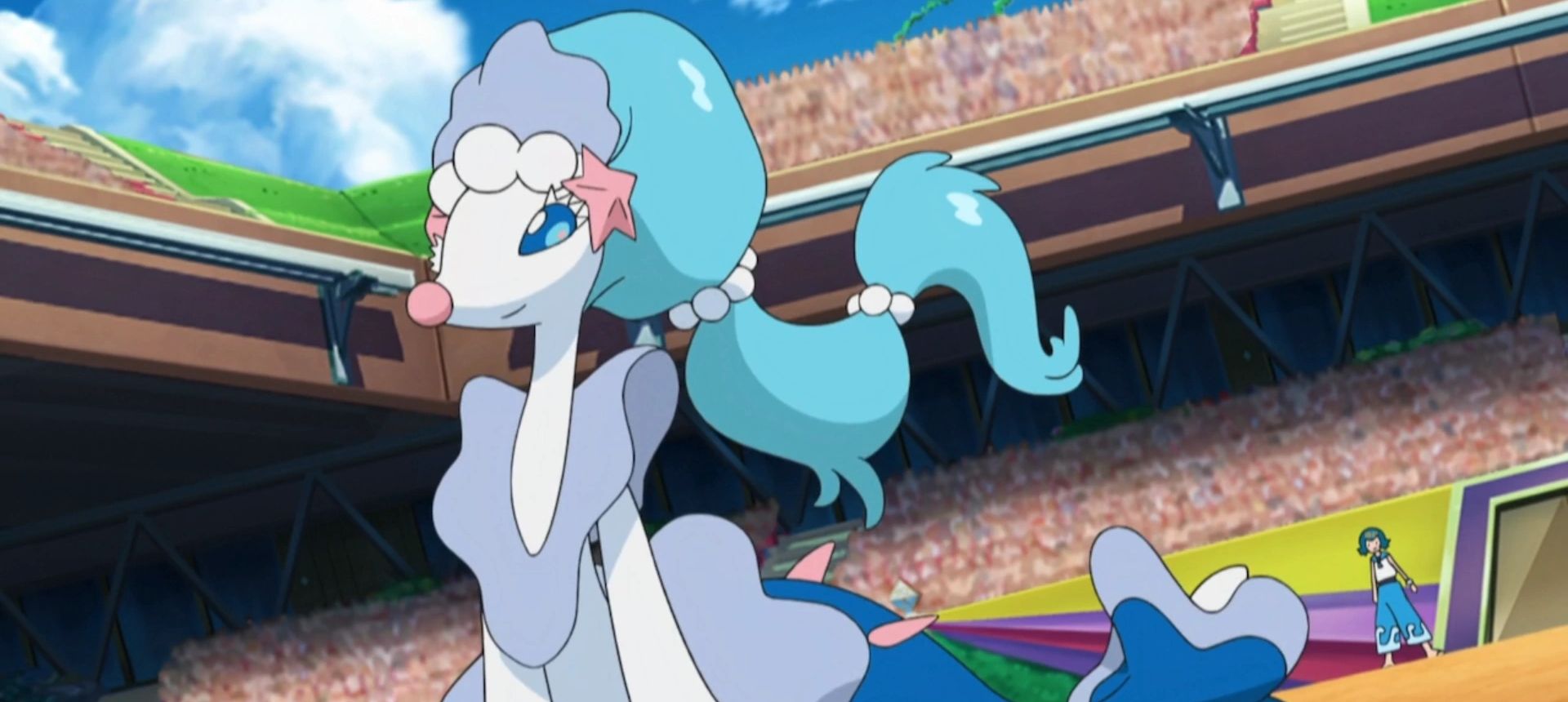 Primarina looks in the distance in a crowded stadium in the Pokemon anime.