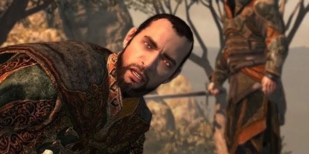 Prince Ahmet crouches next to Ezio's sword in Assassin's Creed Revelations