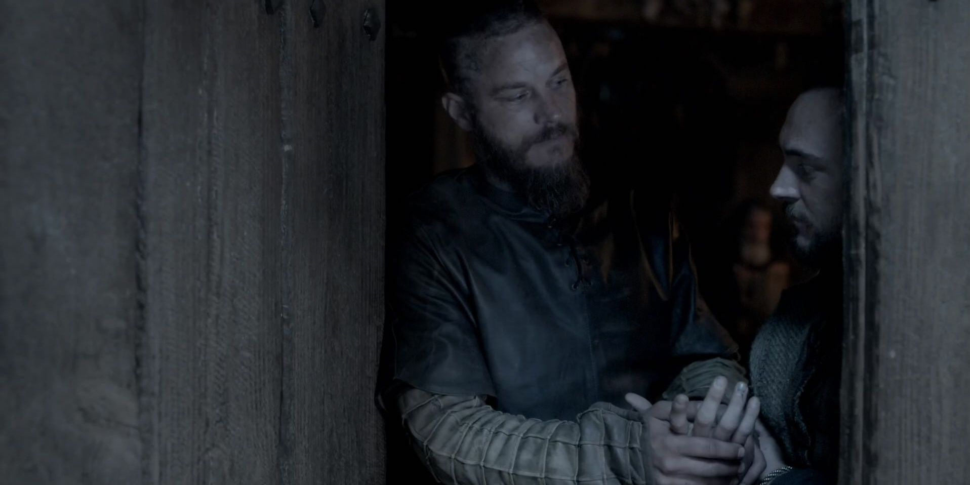 Athelstan reassures a wounded Ragnar that he'll get better in Vikings