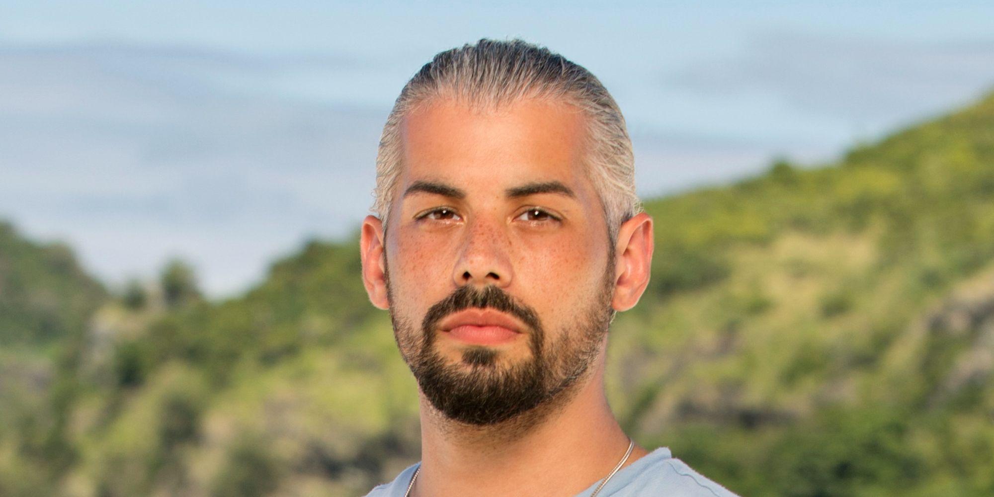 Ricard Foye looking at the camera with a serious expression in Survivor season 41