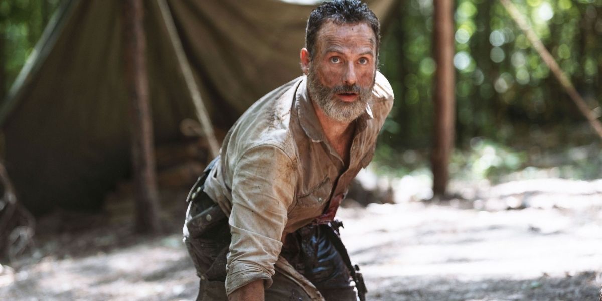 Rick Grimes kneeling on the floor in The Walking Dead