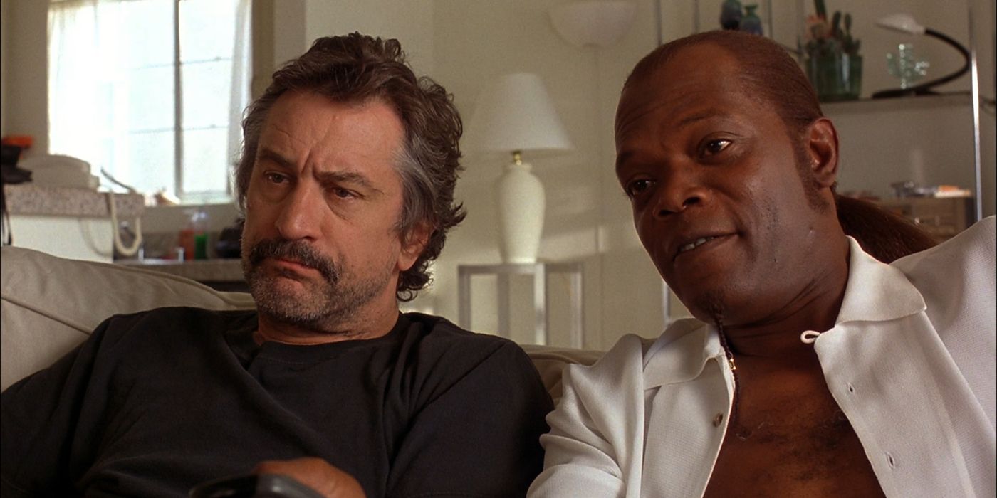 Robert De Niro and Samuel L Jackson sitting on a couch in Jackie Brown.