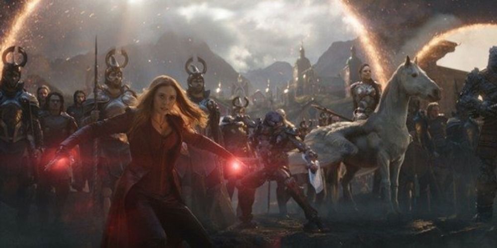 Scarlet Witch posing in front of the portals and Asgardians in Avengers Endgame