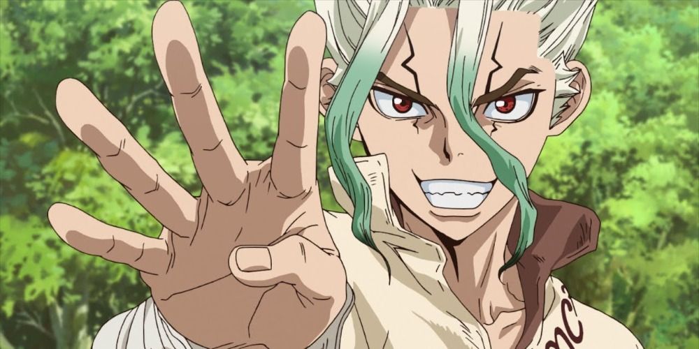 Senku from Dr Stone grinning and holding out his hand