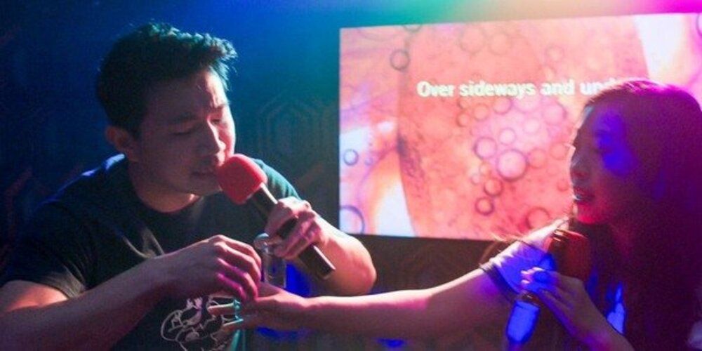Shang-Chi and Katy sing karaoke in Shang-Chi movie.
