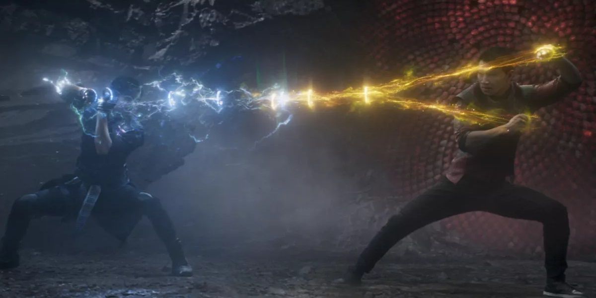 Shang Chi and Wenwu fighting with their magic powers