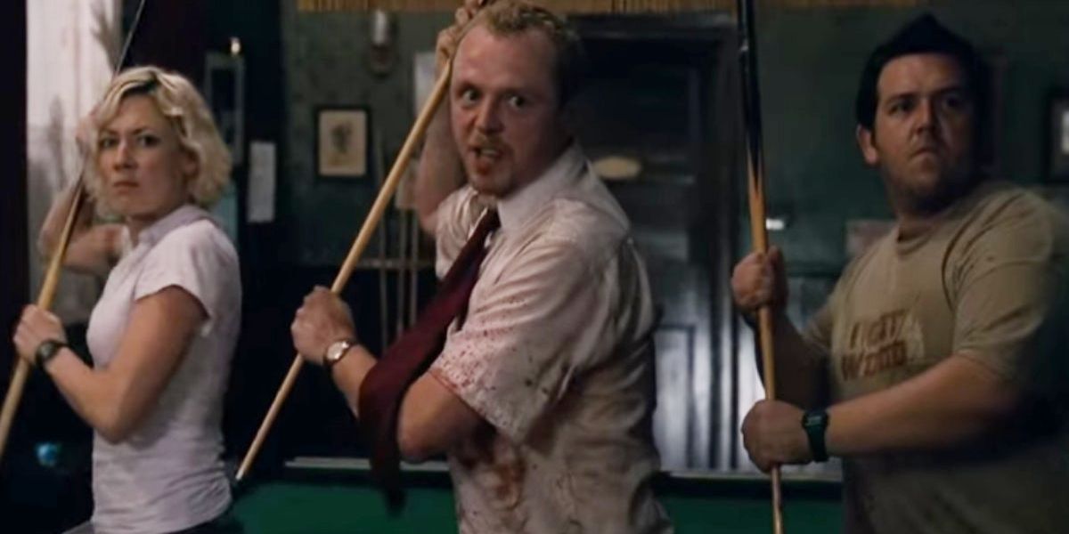 Shaun and his friends raise pool sticks to fight in Shaun of the Dead.