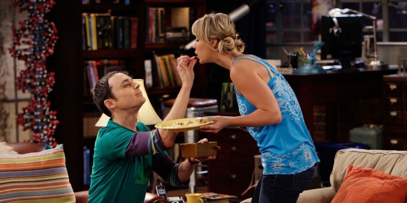 Sheldon feeds Penny a piece of chocolate on TBBT