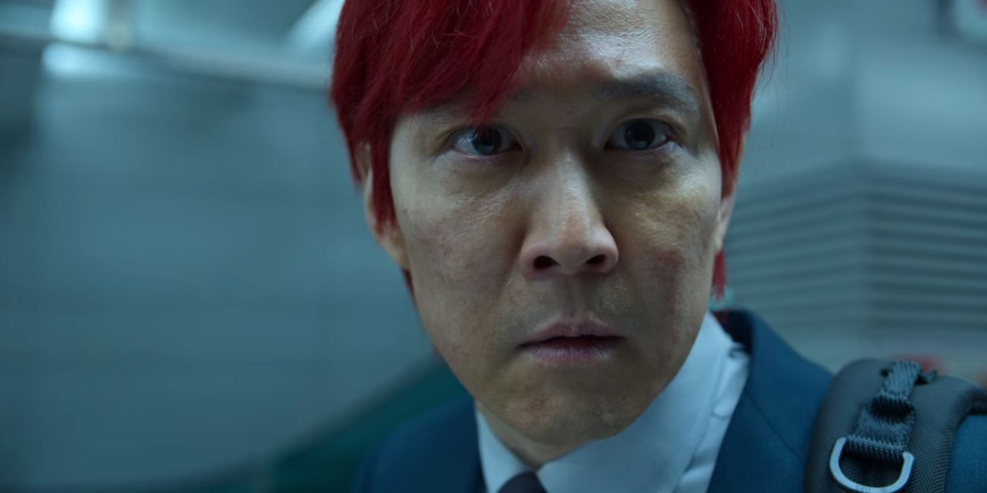 Gi-Hun with red hair looking scared