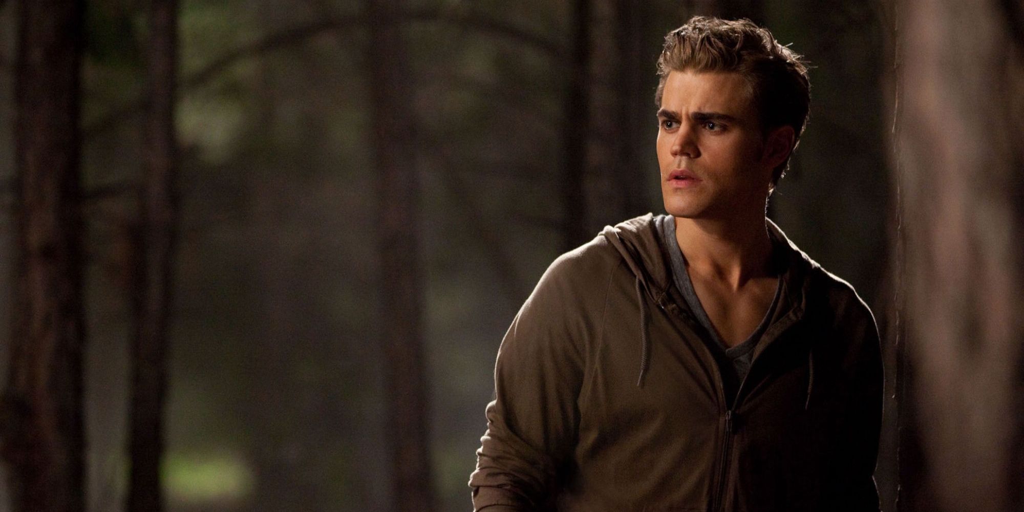 Stefan Salvatore in the woods in The Vampire Diaries.