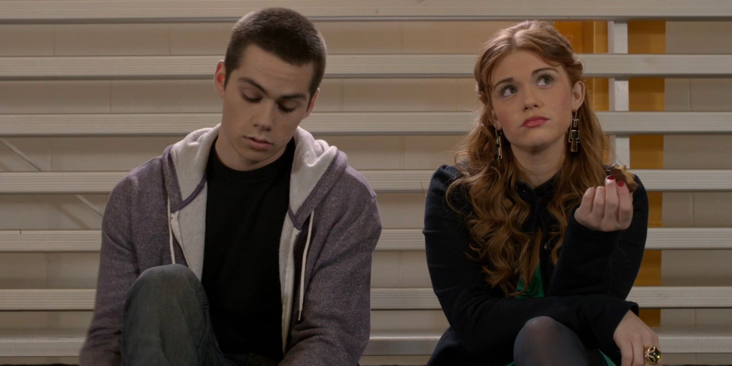 Stiles and Lydia sitting at the ice rink in Teen Wolf..